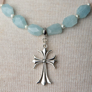 Jennifer’s Aquamarine and Rose Quartz Cross Necklace