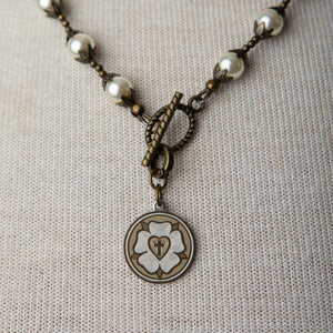 Jennifer’s Swarovski Glass Pearl and Antiqued Brass Luther’s Rose Necklace