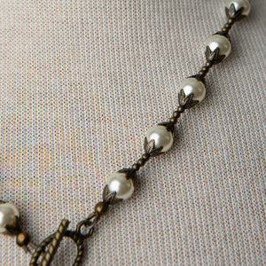 Jennifer’s Swarovski Glass Pearl and Antiqued Brass Luther’s Rose Necklace