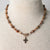 Jennifer’s Leopard Jasper, Rutilated Quartz, and Cubic Zirconia, Copper Cross Necklace