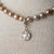 Jennifer’s Golden Knotted Pearl Luther’s Rose Necklace