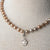 Jennifer’s Golden Knotted Pearl Luther’s Rose Necklace