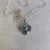 Kathy’s Handcrafted Silver and Gold Cross with Turquoise